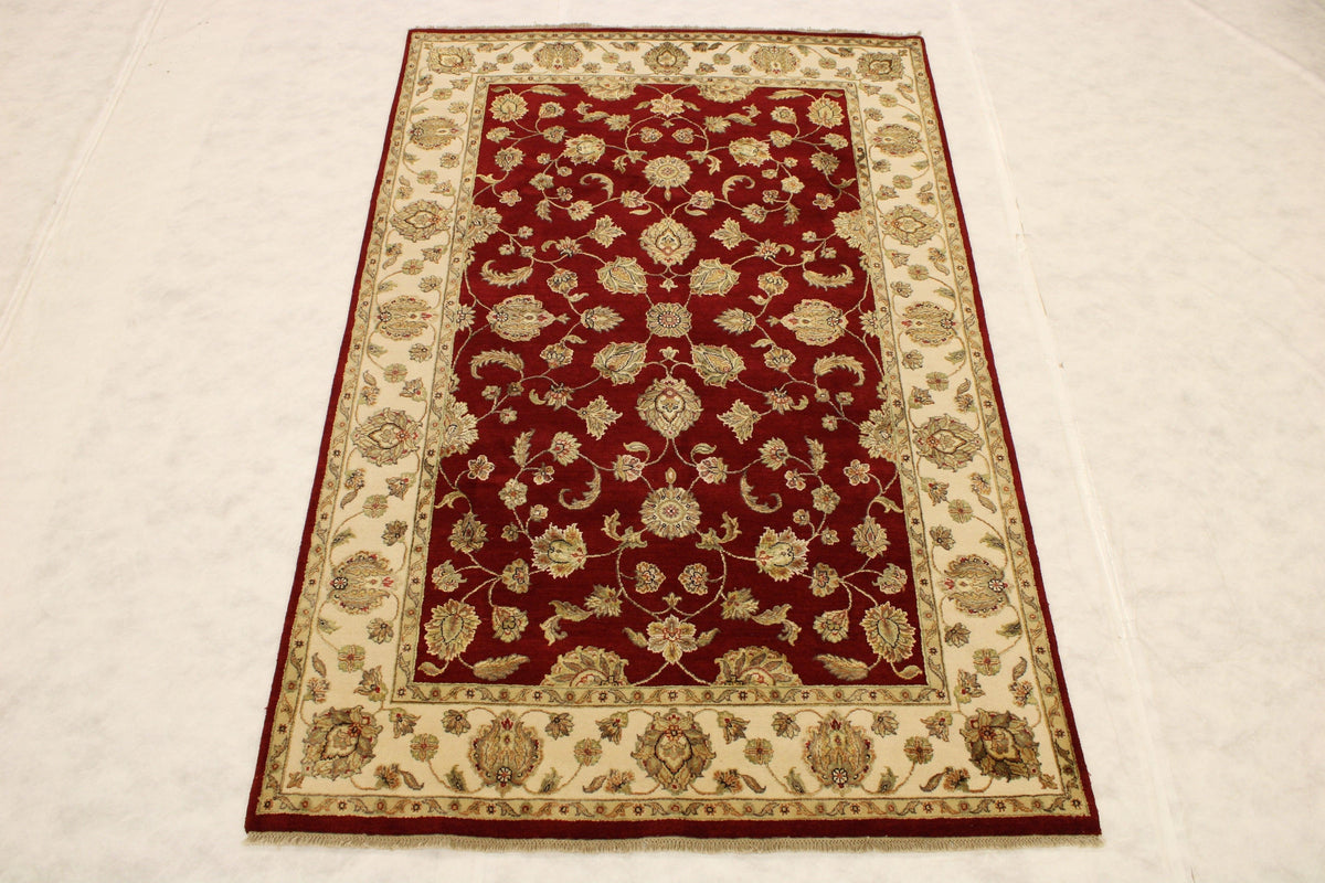 average living room size, rug on carpet